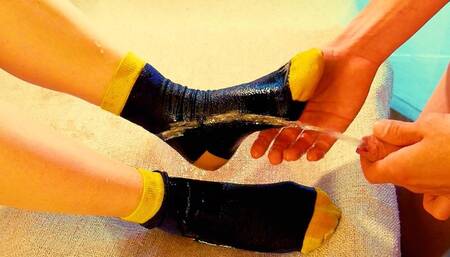 (POV) Pissing her feet in cute blue and yellow socks dripping wet (artwork without audio)