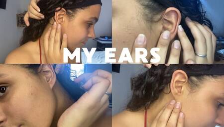 TOUCHING MY EARS