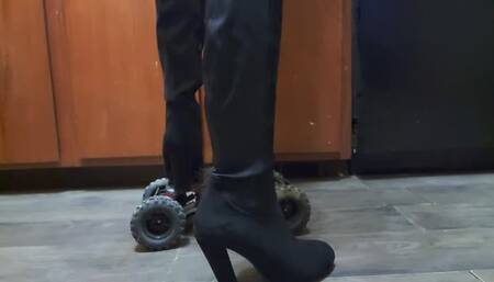 Heeled boot car crush
