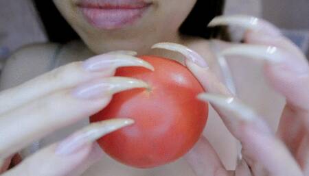 The process of my sharp long nails destroys tomato