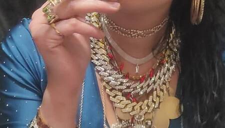 Anna Sparkle smoking cigar and dangling cigarete