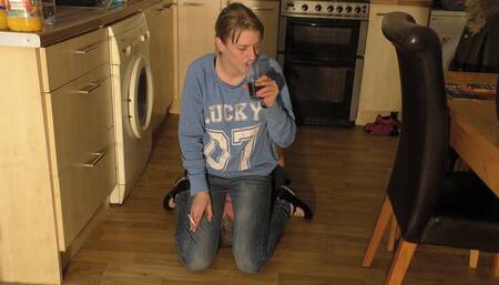 Chelsea Face Siting In Jeans On Her Kitchen Floor