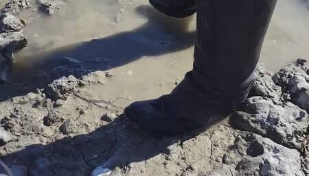 High heel boots in the mud