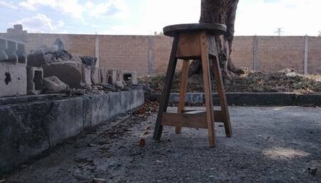 With my legs crossed and stiletto heels dangling from my feet (1)