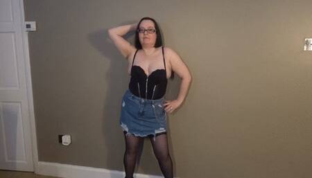 stripping in denim miniskirt holdups and heels