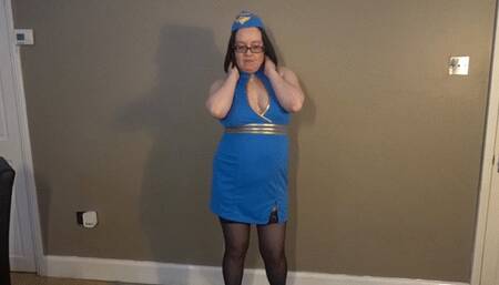 stewardess sexy dancing striptease in stockings and heels