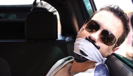 Hunky driver is tied up and gagged in his car (Part 2)