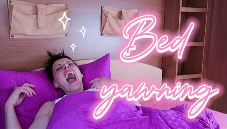 Bed yawning
