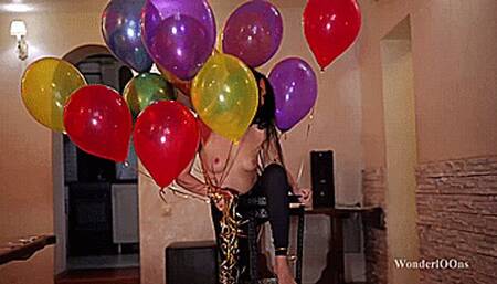 Keira sit pop helium balloons