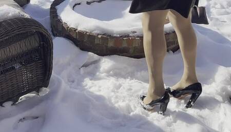 Playing with Heels in the Snow