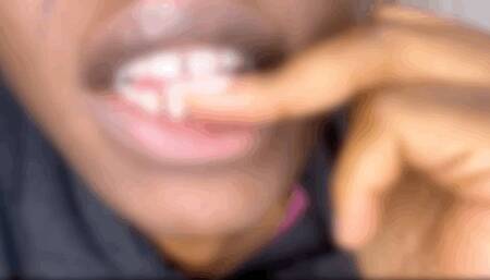 Close up Biting my Fake Nails Off