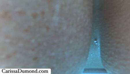 Carissa in the pool playing with the silicon banana dildo