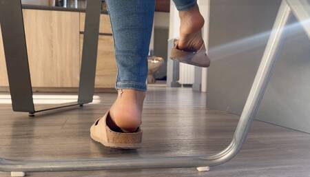 Birkenstock and jeans under the table