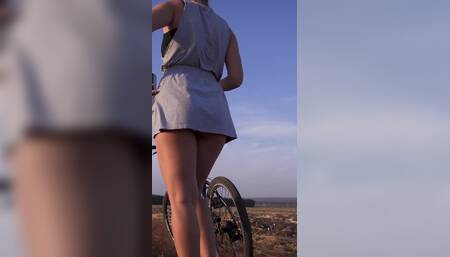 Cycling Outdoors and Flashing Ass in Miniskirt