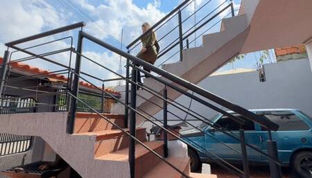 Karlotta smokes while trying to start the Fiat