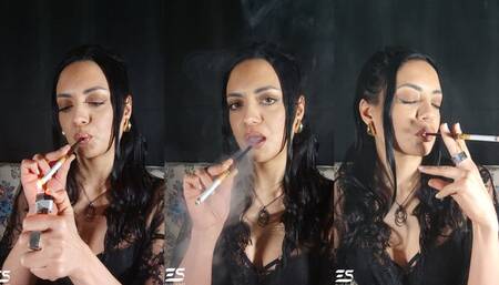 Smoking a cigarette in a lace robe and bra with a cigarette holder