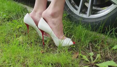 High heels stuck in a ground, high heels sinking, high heels wrecked, shoes stuck in dirt and ground