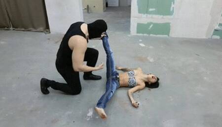 The robber destroys Tiffany with low blows