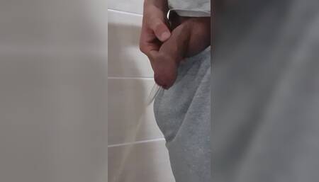 Guy Long Pissing with Uncircumcised Cock and Big Balls