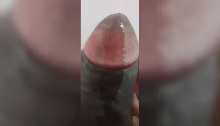 A Person Is Enjoying Some Private Time in His Bedroom.