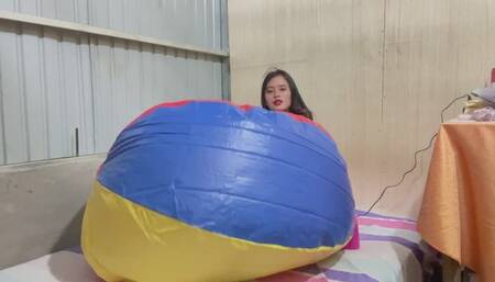 Inflating and deflating big beach ball