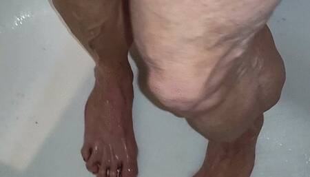 Steamy calves in the shower