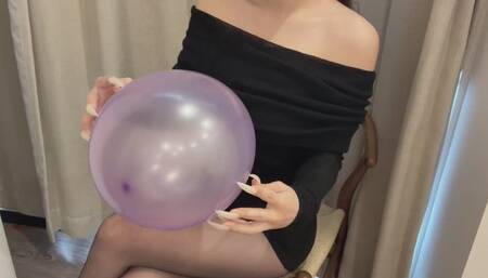 Popping balloons with my long nails (Two)