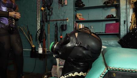 Rubber Drone in a fleshlight gasmask, gets used by Mistress Envy and her Filthy Friend Rubber Rose
