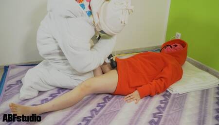 Bondaged man in fleece sleeping bag make his girlfriend by microphone