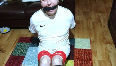 Footballer bound and gagged escape challenge in red rope 5