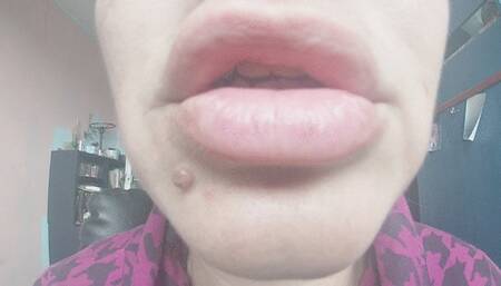 Two red lipsticks and kiss