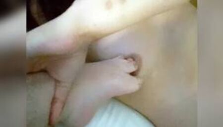 Girl uses foot of cripple friend to massage her breast