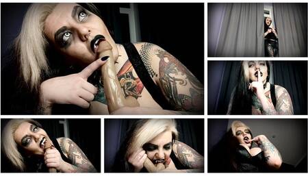 Awesome blow job from a gothic, tattooed vampire slut with big tits