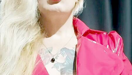 Mistress on vinyl, smoking her Djarum Black * Close-up *