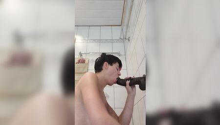 In the bathroom with dildo