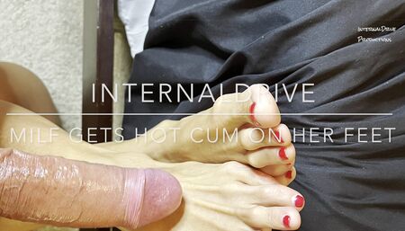 Milf gets hot cum on her feet and licks it off.