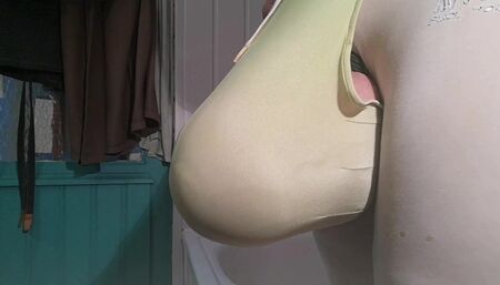 Pissing inside a xxxlarge condom