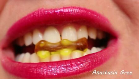 The sharpest teeth bite jelly. Extreme close up