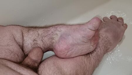Midget shows his feet and then cums on them