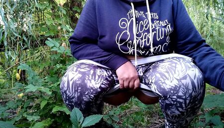 Lush MILF golden shower solo in nature