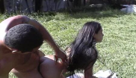 Shorty tgirl with a small dick fucked on the grass field by an active dude