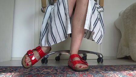 Red patent leather slippers with a long summer dress