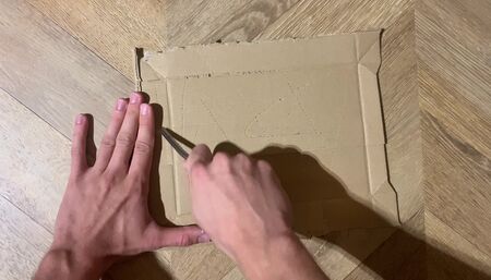 ASMR compas scratching cardboard