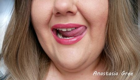 Sensual licking of plump lips