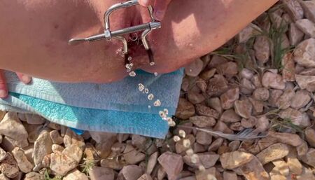 Guy pees inside my pussy with a speculum on the beach